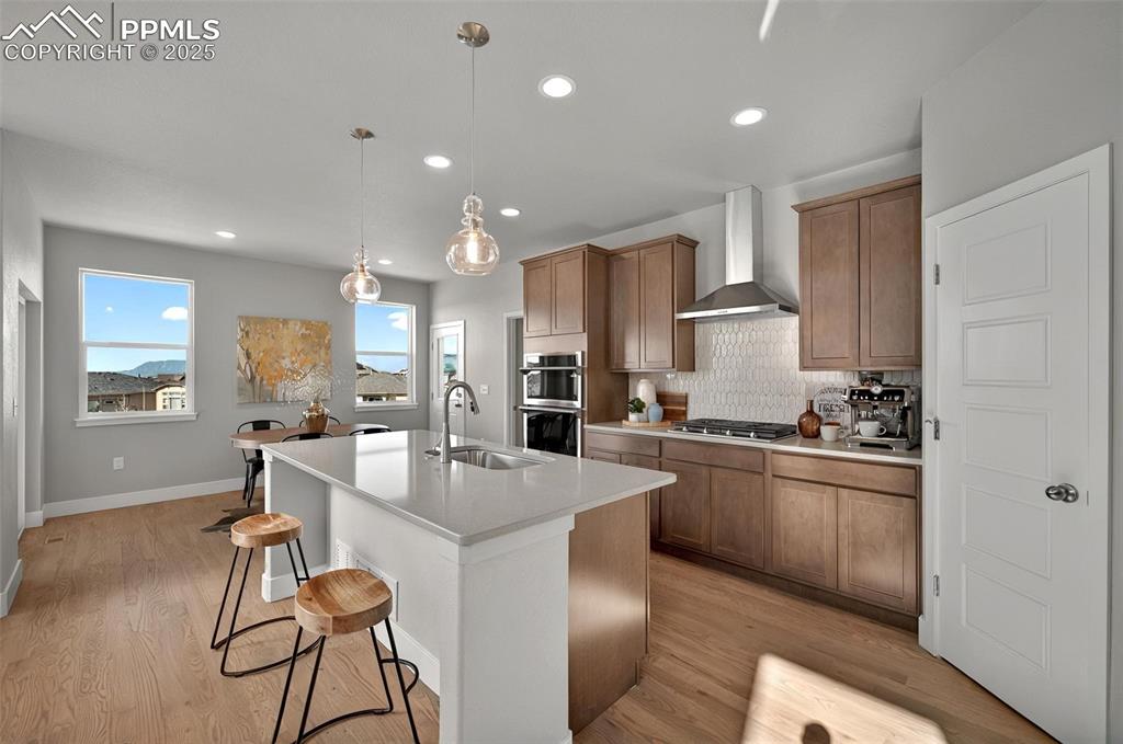 Image 9 of 49: Quartz counters, upgraded lights and views!