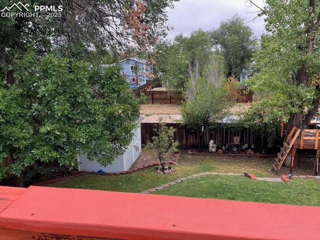 Image 2 of 17: View of yard featuring a deck
