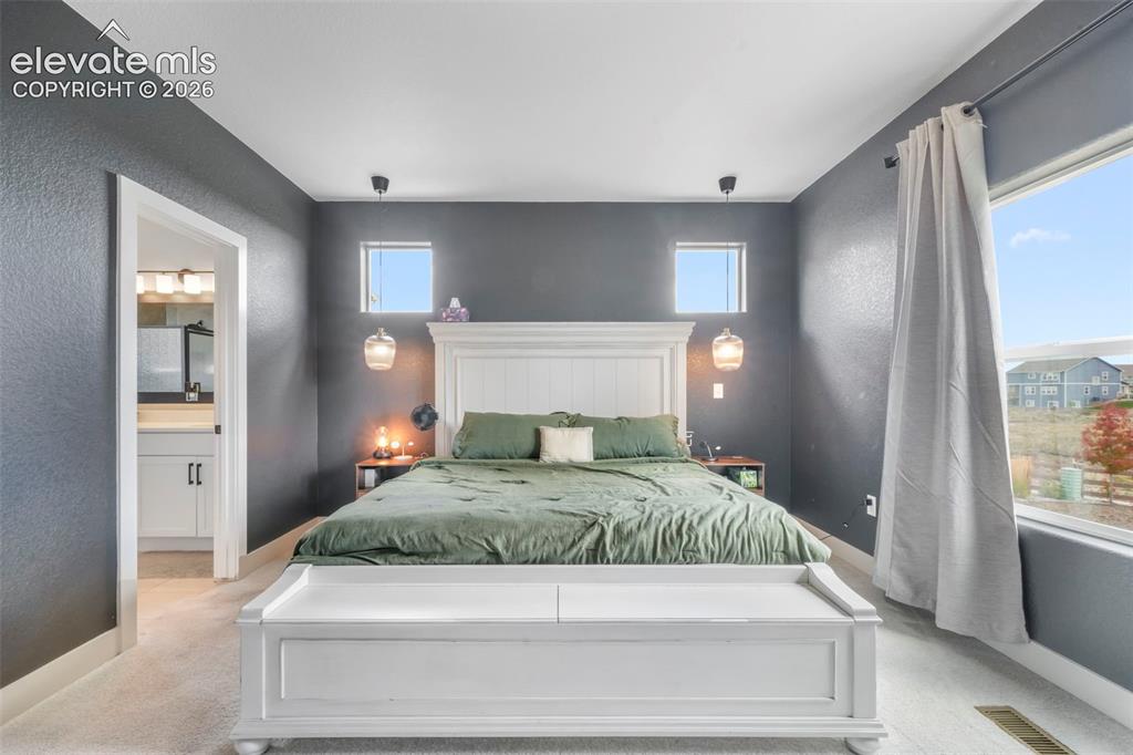 Image 20 of 50: Master Bedroom