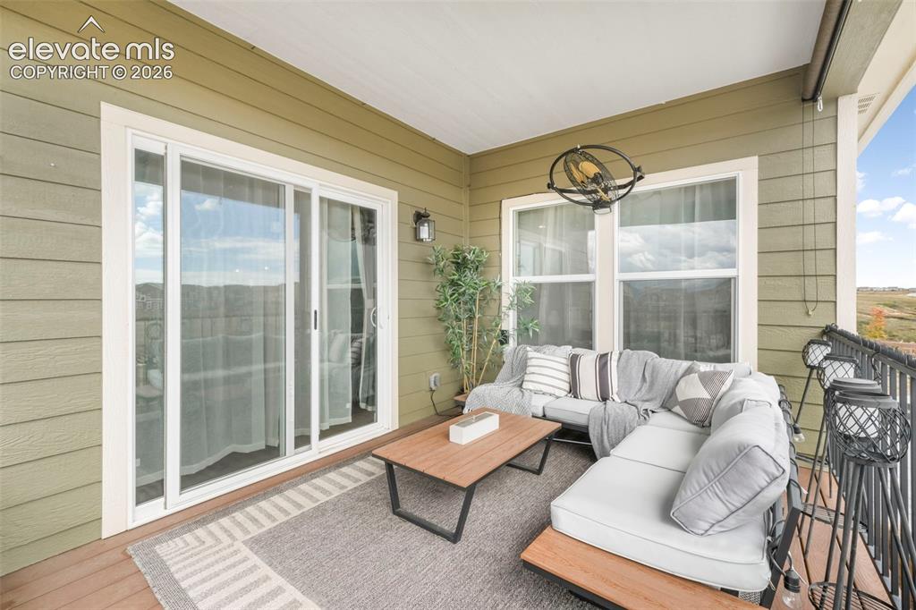 Image 46 of 50: Covered deck off of the dining room