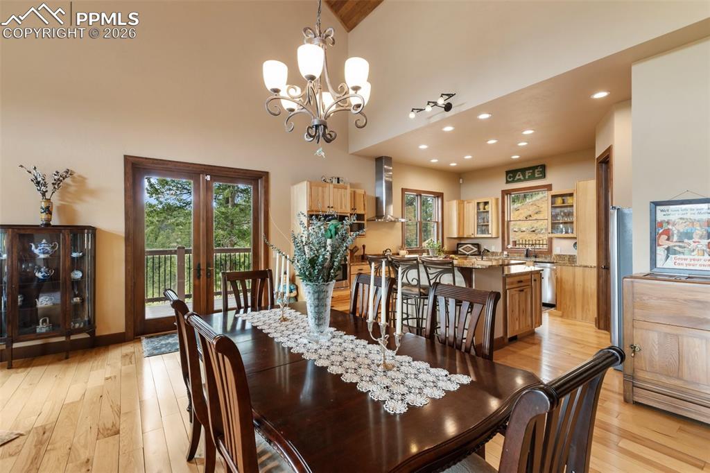 Image 15 of 48: Living room and view of Pikes Peak!