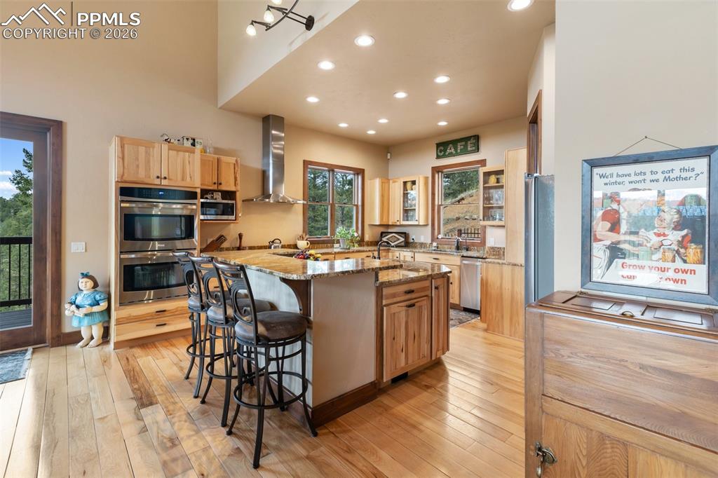Image 16 of 48: Living room with gas fireplace