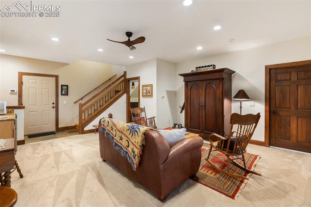 Image 34 of 48: Primary bedroom with sitting space. Main level.