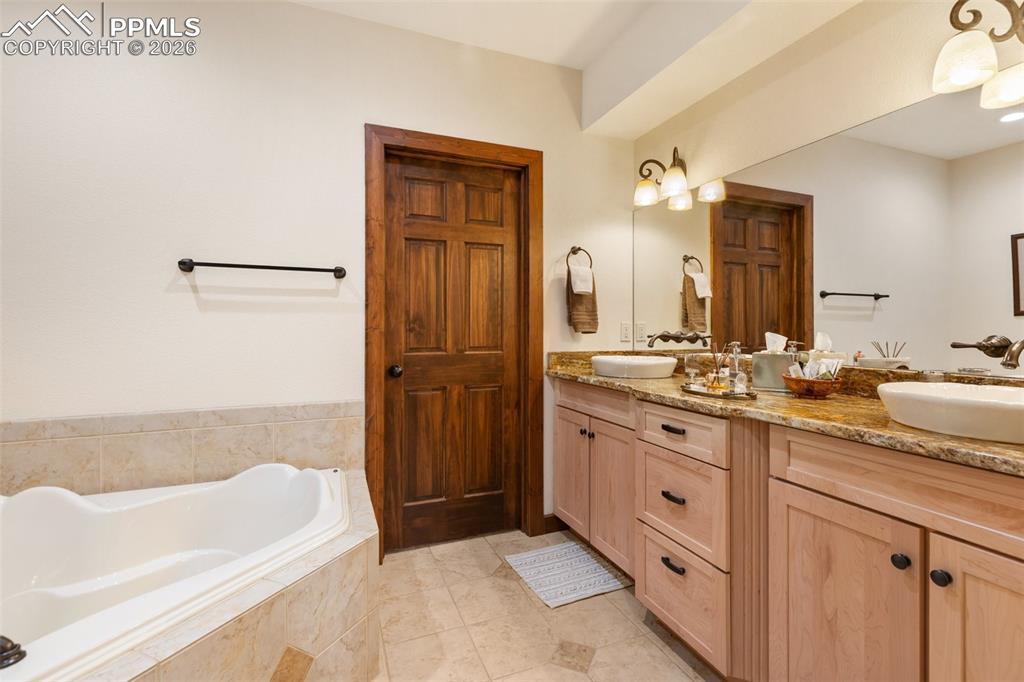 Image 38 of 47: Bedroom with Jack and Jill Bathroom