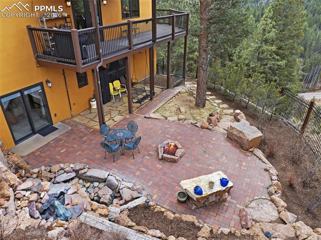 Image 5 of 47: Back yard with water feature