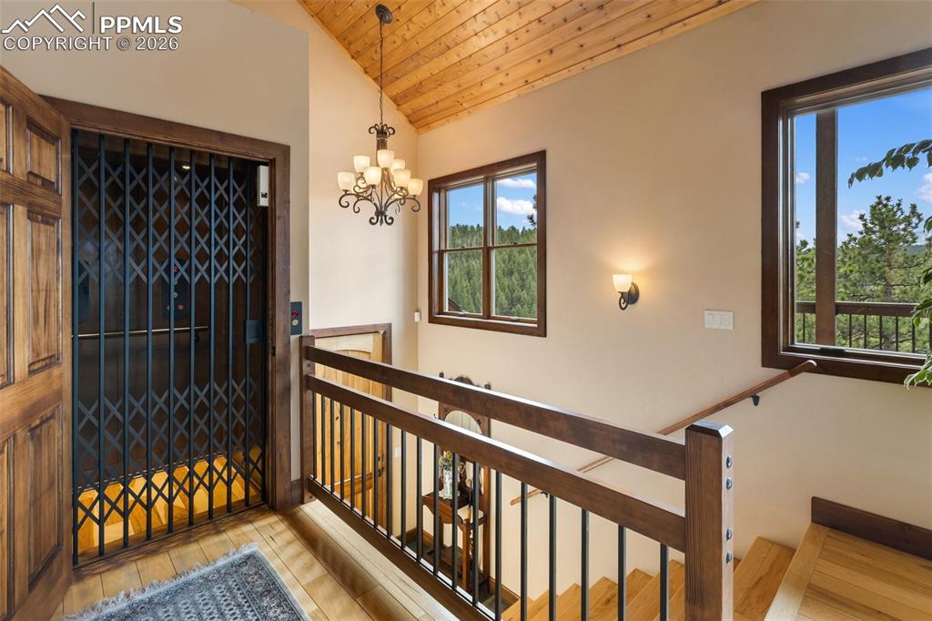 Image 7 of 47: Living room and view of Pikes Peak!
