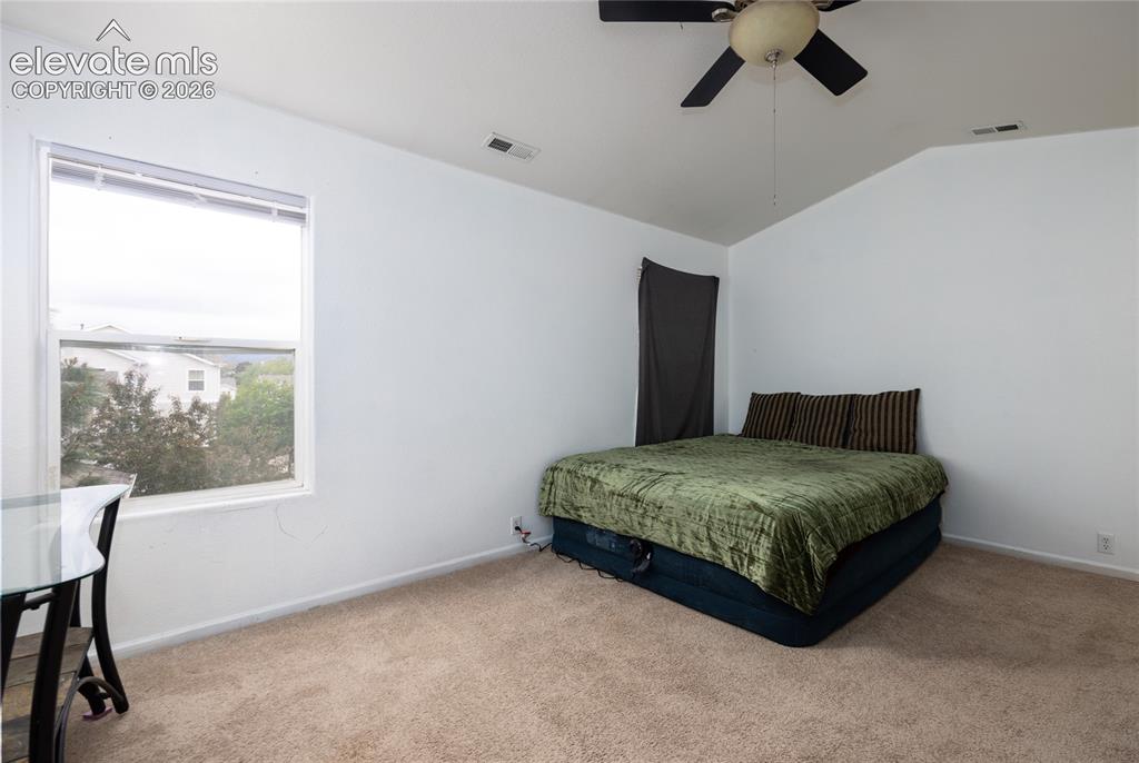 Image 23 of 26: Bright open and airy with ceiling fan