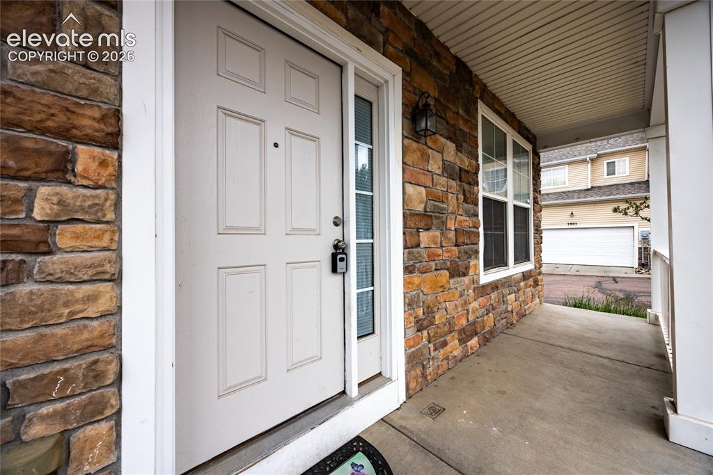 Image 3 of 26: Lovely covered front porch