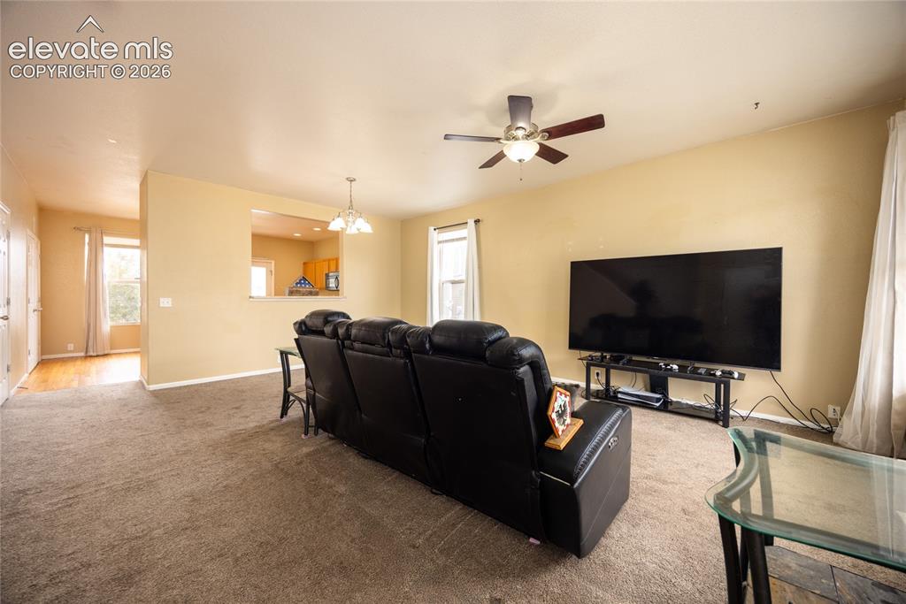 Image 4 of 26: Living Room and dining room