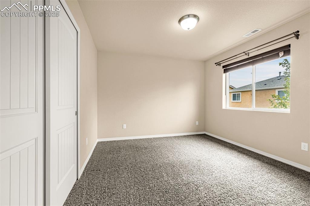 Image 25 of 29: Bedroom