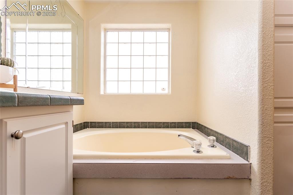 Image 13 of 50: Master Bathroom