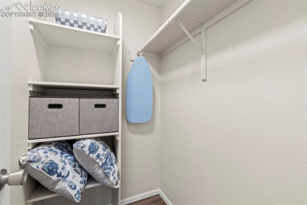Image 30 of 42: Walk-in with built-ins in bedroom 2