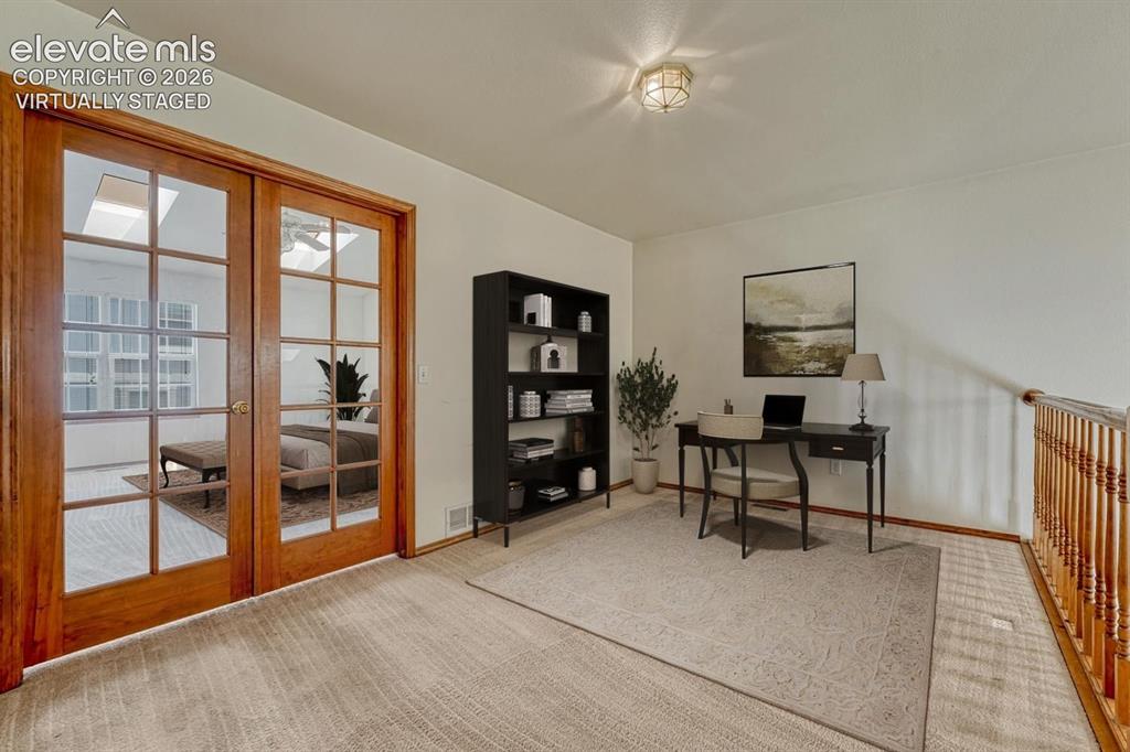 Image 20 of 50: Loft is a flexible space, great for an office, study, or home gym. Virtuall