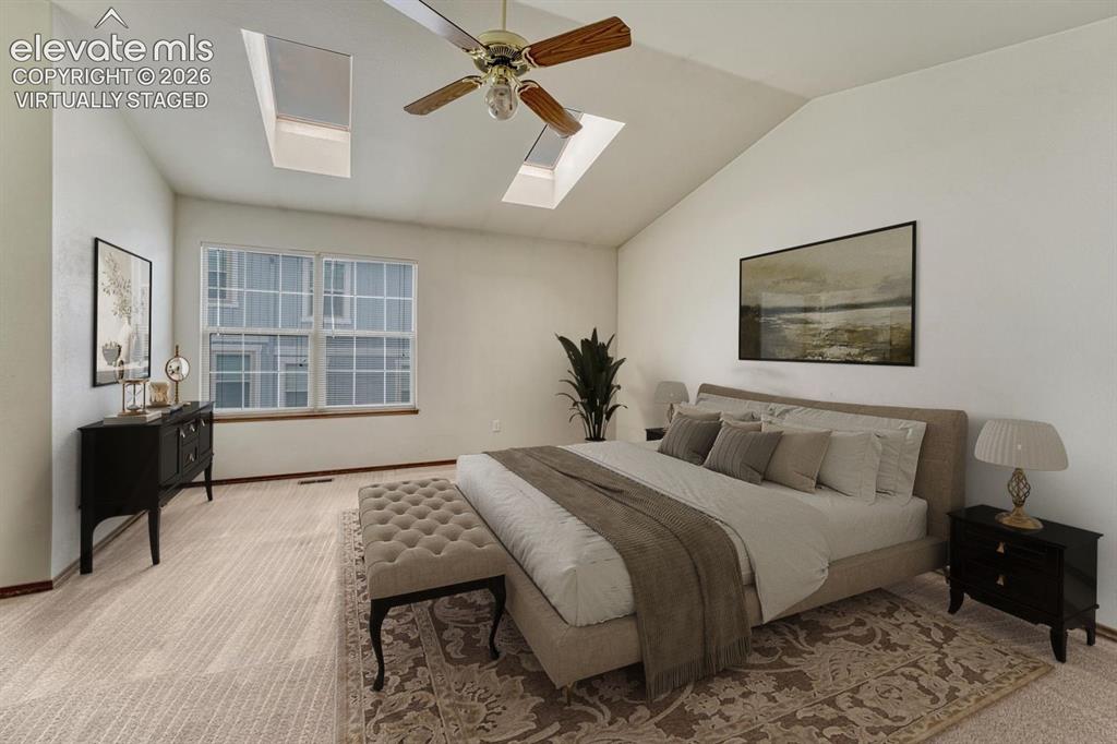 Image 22 of 50: Skylights let in abundant natural light. Virtually staged.