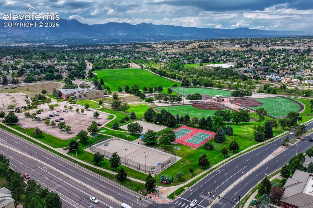 Image 38 of 50: Play tennis, basketball, and hockey at Cottonwood Creek Park!
