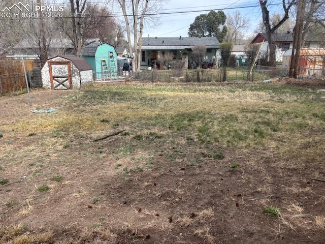 Image 6 of 15: view of Back yard from back of house