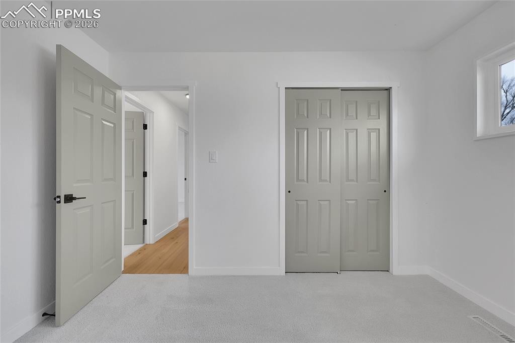 Image 13 of 29: Master Bedroom