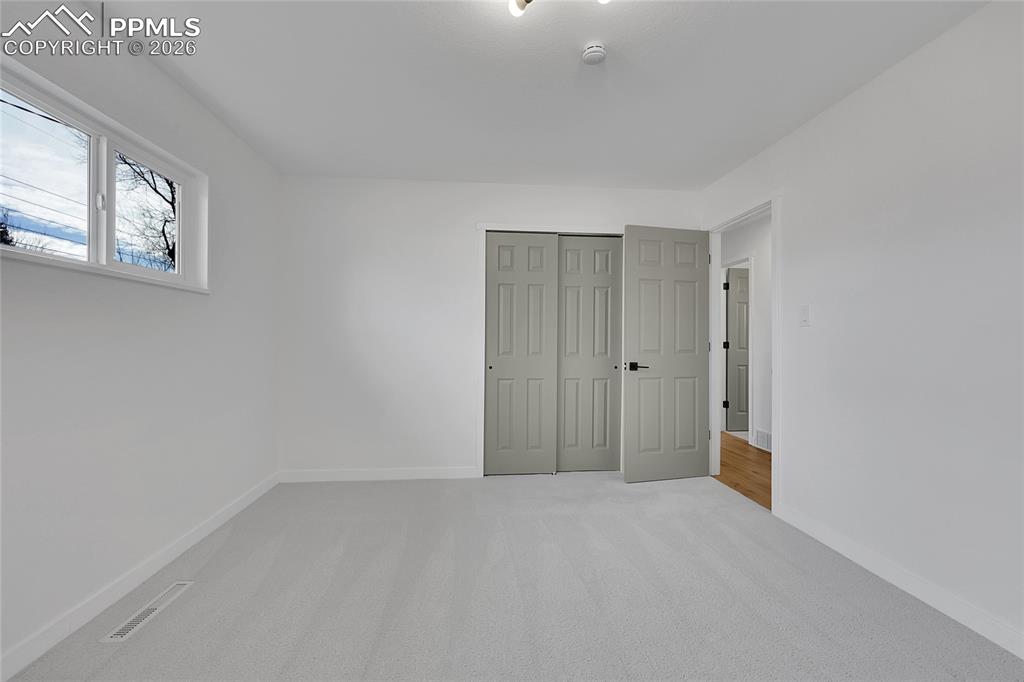 Image 14 of 29: Master Bedroom