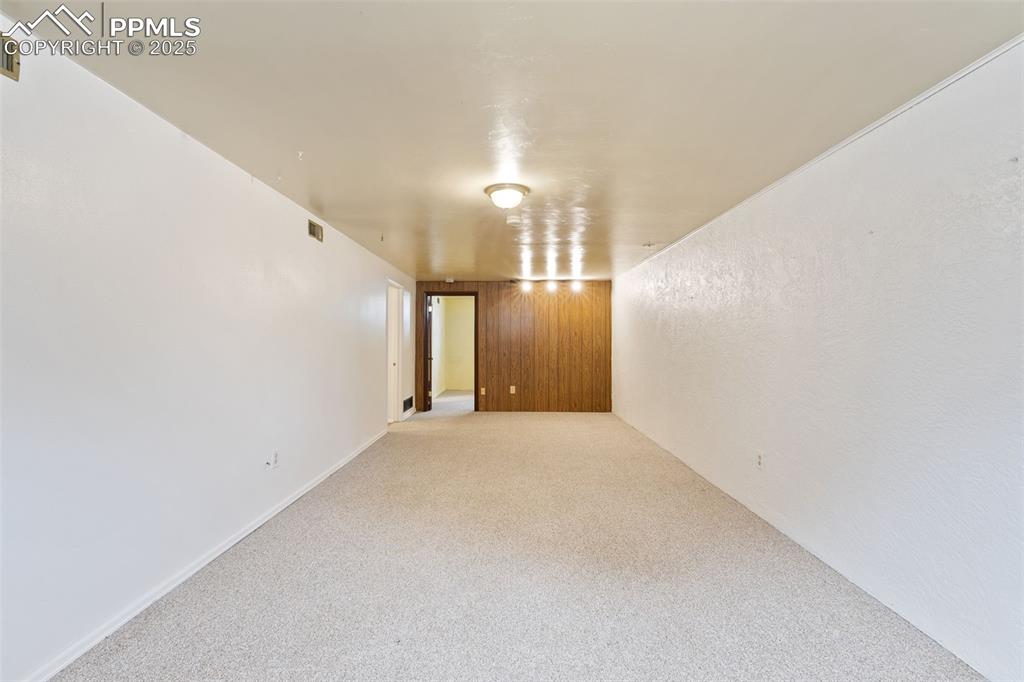 Image 25 of 36: View of carpeted spare room
