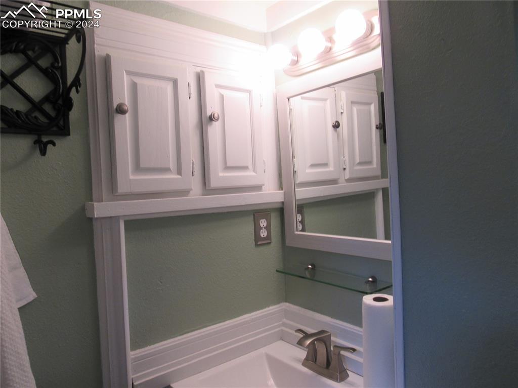 Image 12 of 22: Bathroom with sink