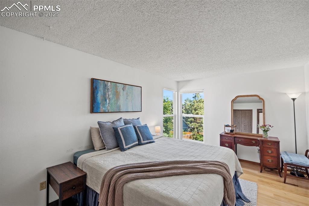 Image 17 of 46: Primary Bedroom, lots of Natural Light