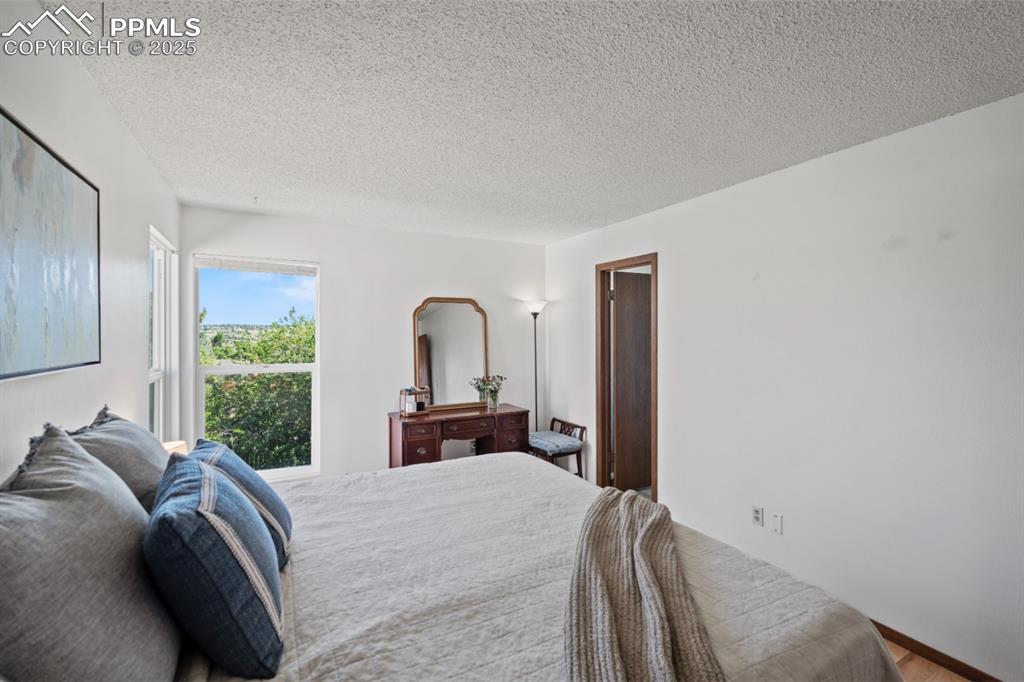 Image 18 of 46: Primary Bedroom, lots of Natural Light