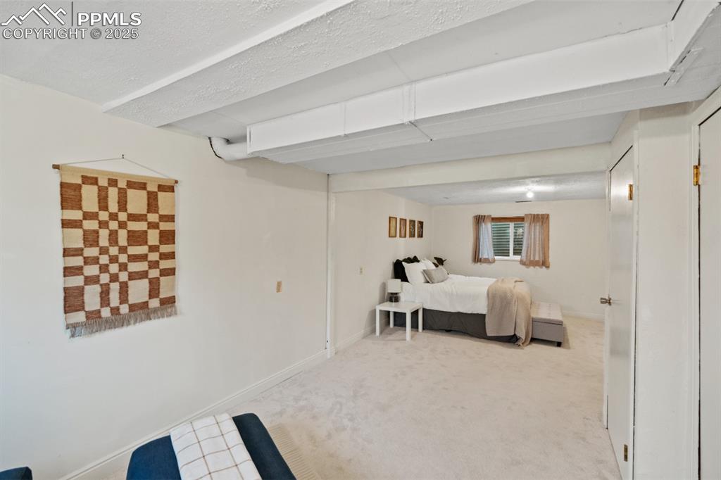 Image 26 of 46: Renovated Basement Bedroom with ensuite Bathroom and sitting area