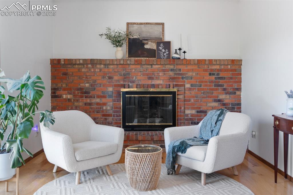 Image 3 of 46: Secondary Living Space with Gas Fireplace (with wood option)