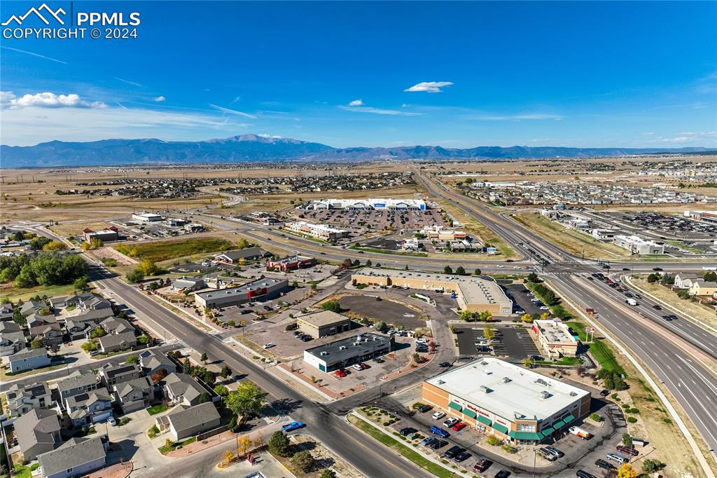 Image 11 of 13: Drone / aerial view with a mountain view