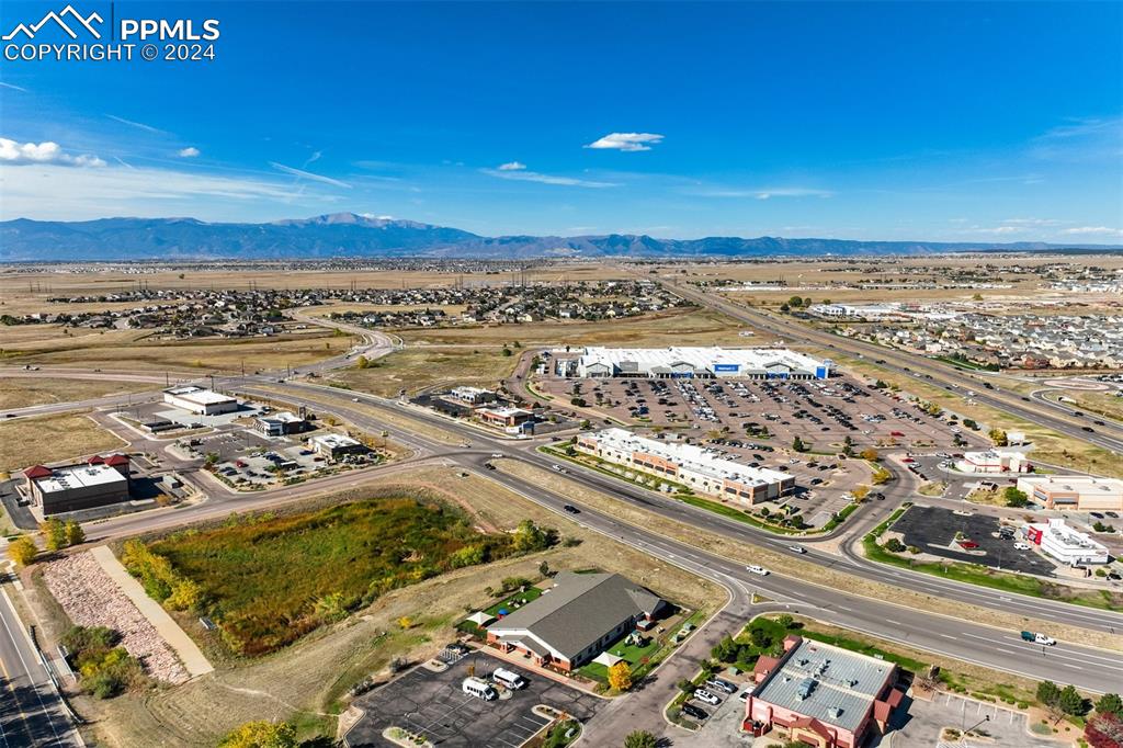 Image 13 of 13: Birds eye view of property featuring a mountain view
