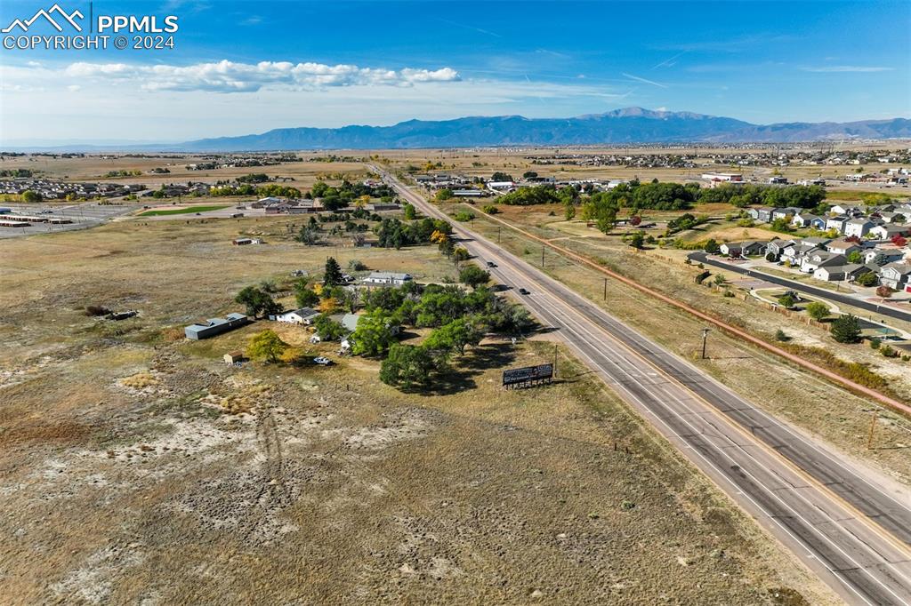 Image 4 of 13: Aerial view featuring a mountain view