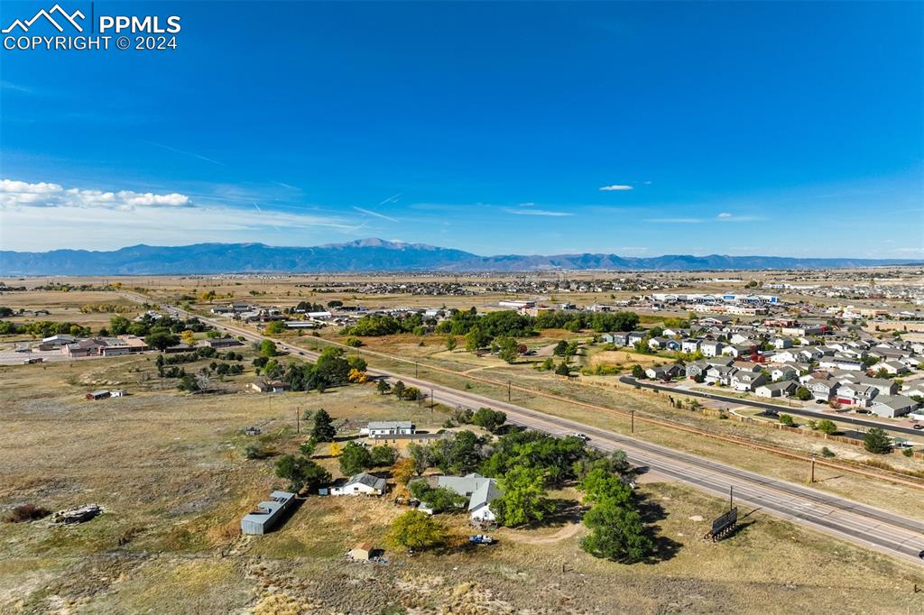 Image 6 of 13: Drone / aerial view featuring a mountain view