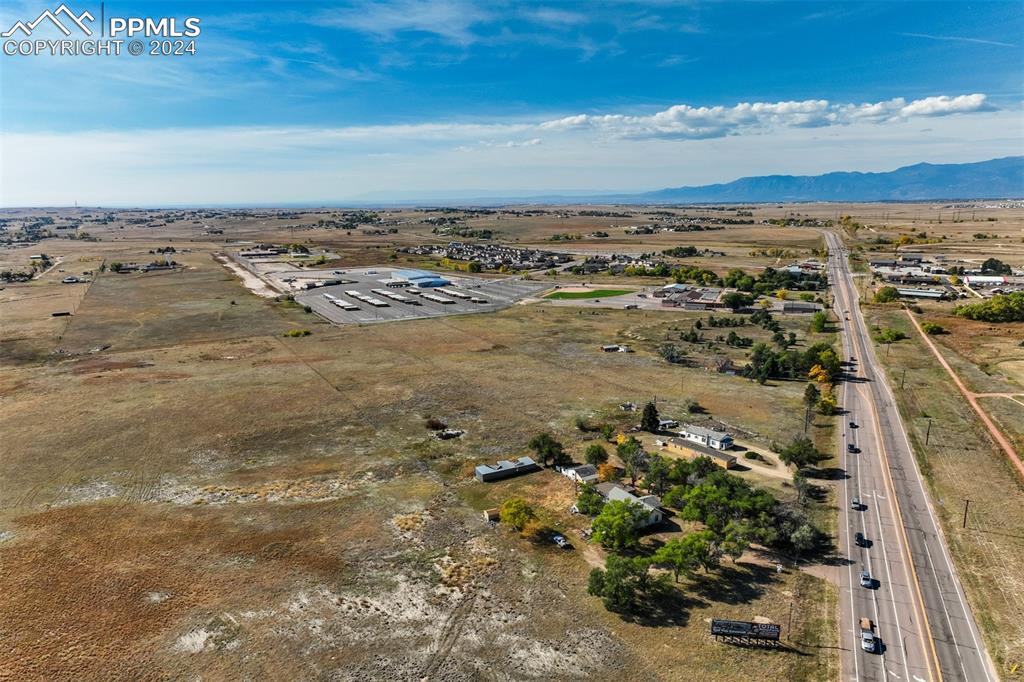 Image 7 of 13: Drone / aerial view with a mountain view