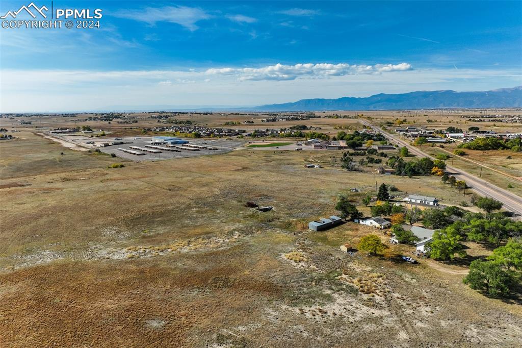 Image 8 of 13: Drone / aerial view with a mountain view