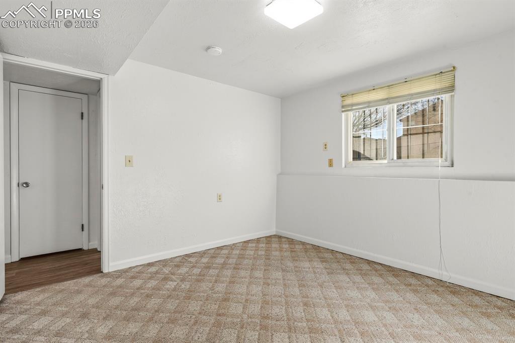 Image 29 of 49: Extra room that can be used as flex space , office , hobby or a gym