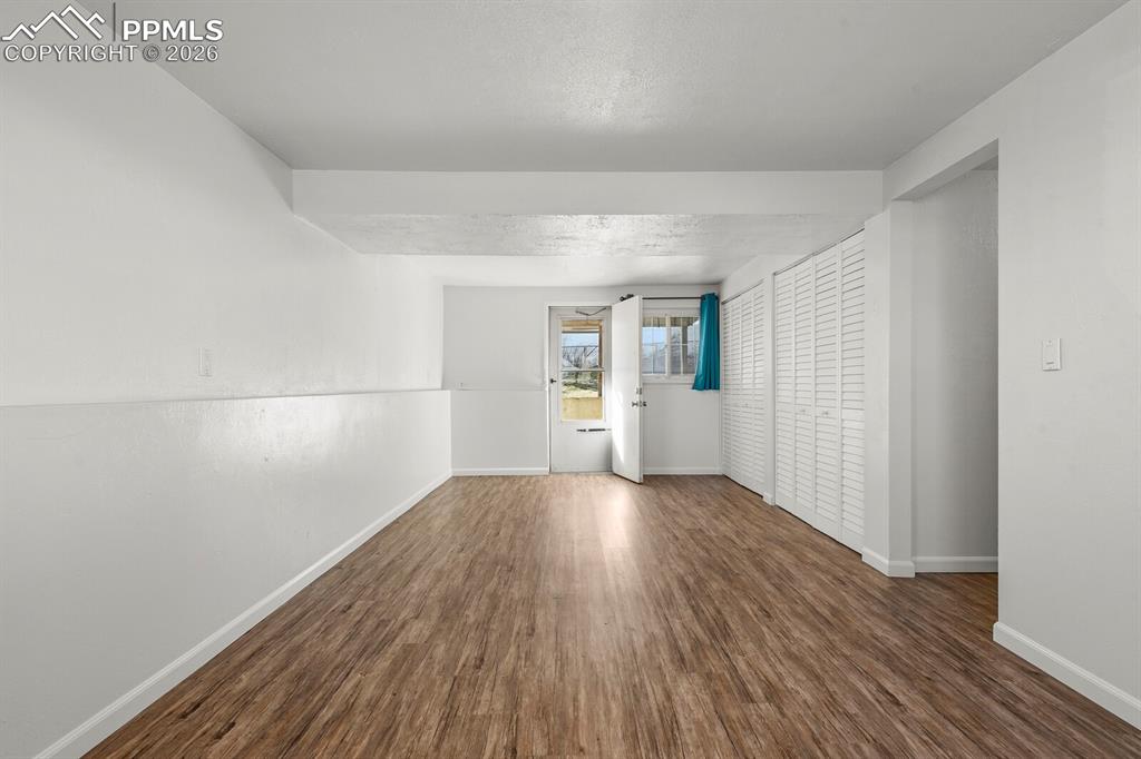 Image 36 of 49: Recreation room in the basement with a walk out to the back yard 
