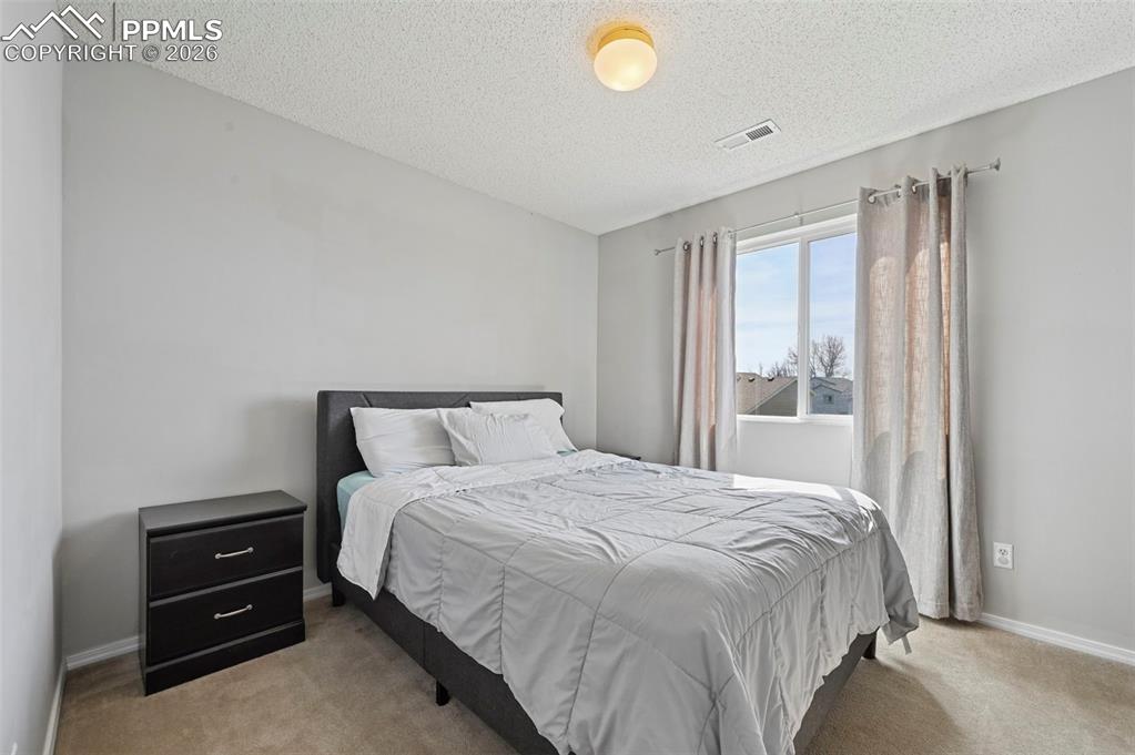 Image 18 of 36: Bedroom