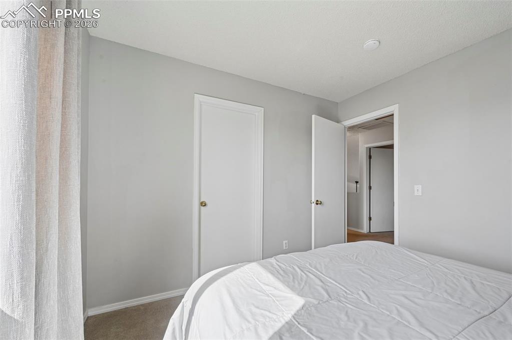 Image 19 of 36: Bedroom