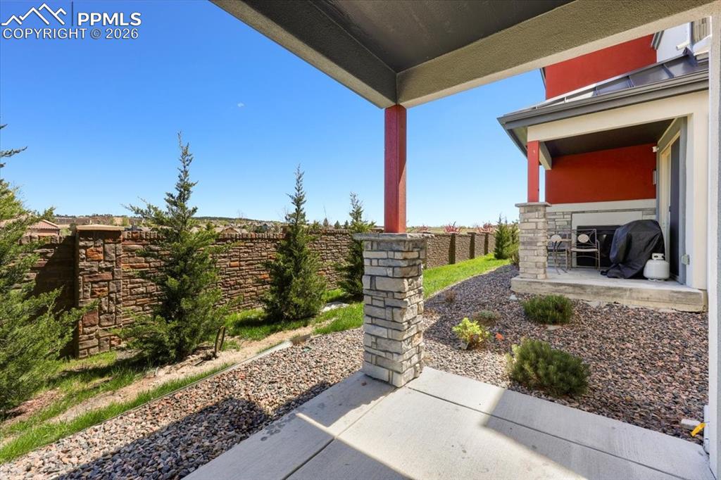 Image 19 of 19: View of patio / terrace with a fenced backyard