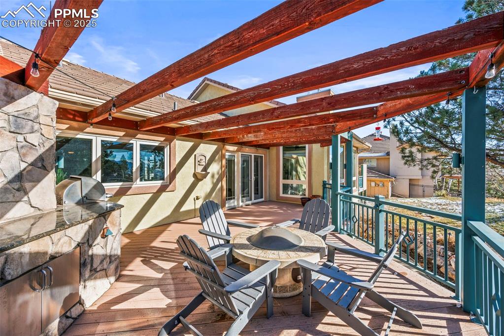 Image 19 of 50: Deck off kitchen/living