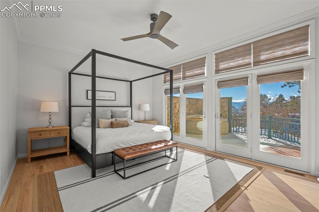 Image 25 of 50: Primary Bedroom with Private Deck