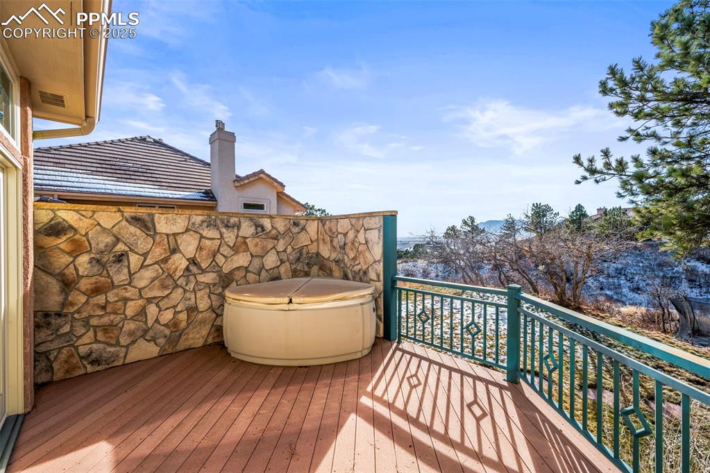 Image 27 of 50: Private deck off primary bedroom