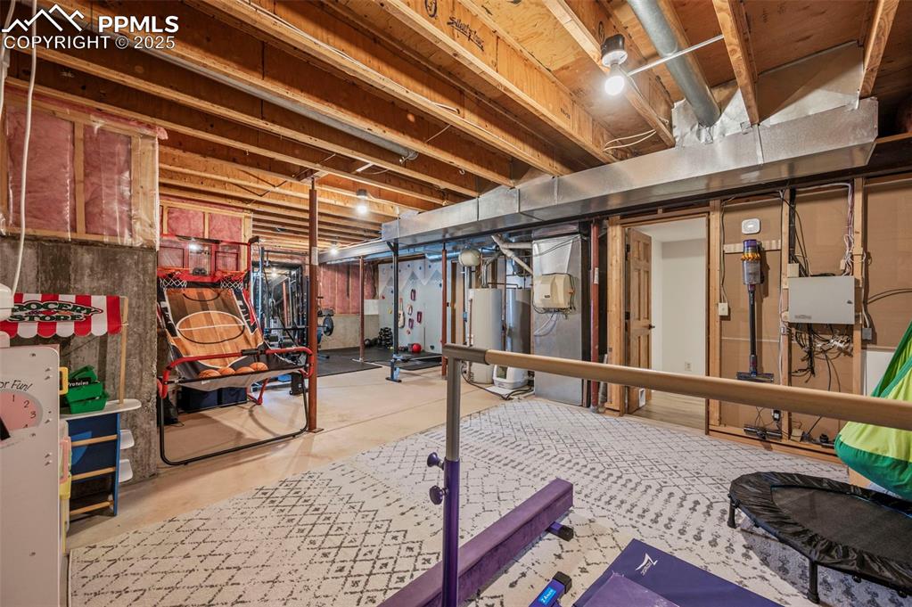 Image 43 of 50: Unfinished space for all the toys