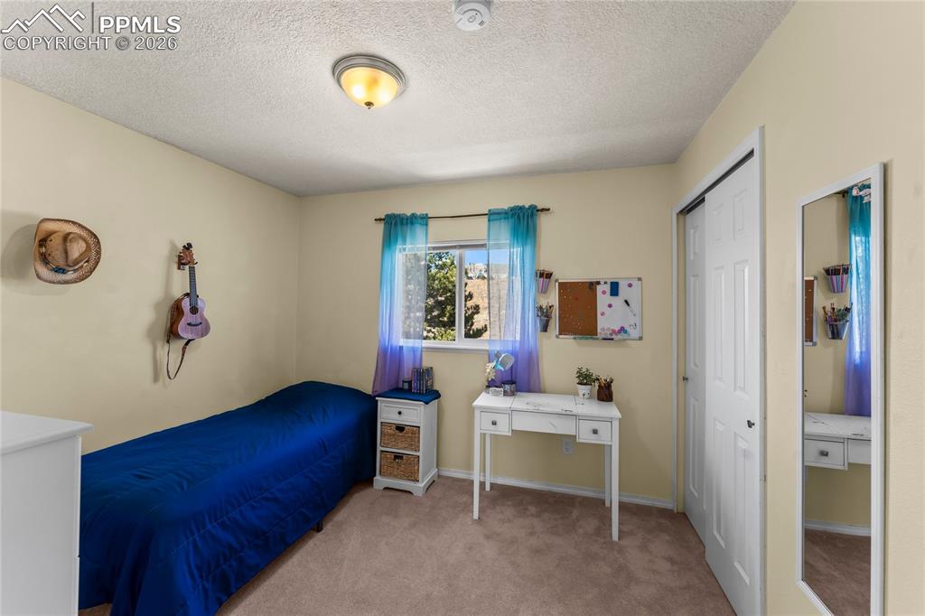 Image 19 of 36: Bedroom