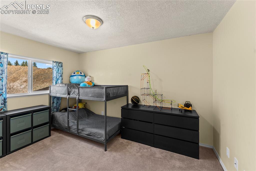 Image 21 of 36: Bedroom