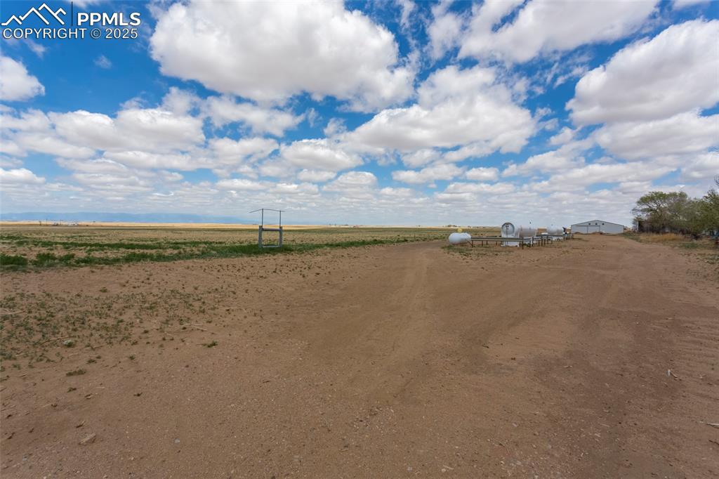Image 24 of 26: View of yard with a rural view