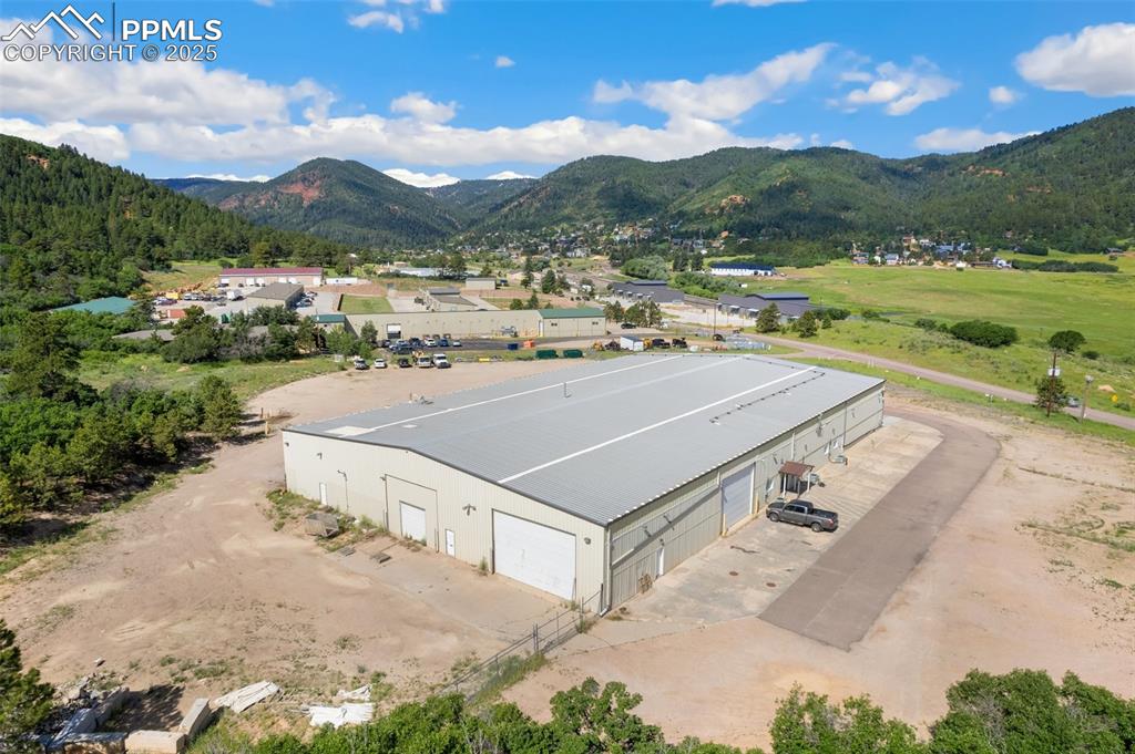 Image 9 of 26: Aerial view of a mountainous background