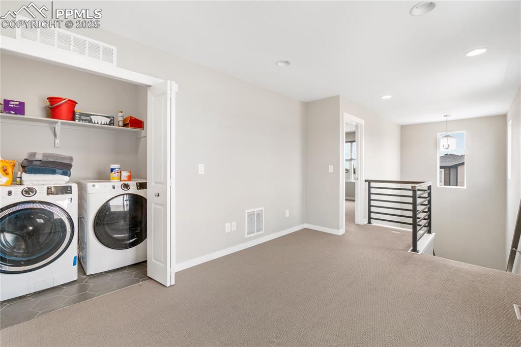 Image 25 of 42: Upper Laundry convenient to same floor bedrroms