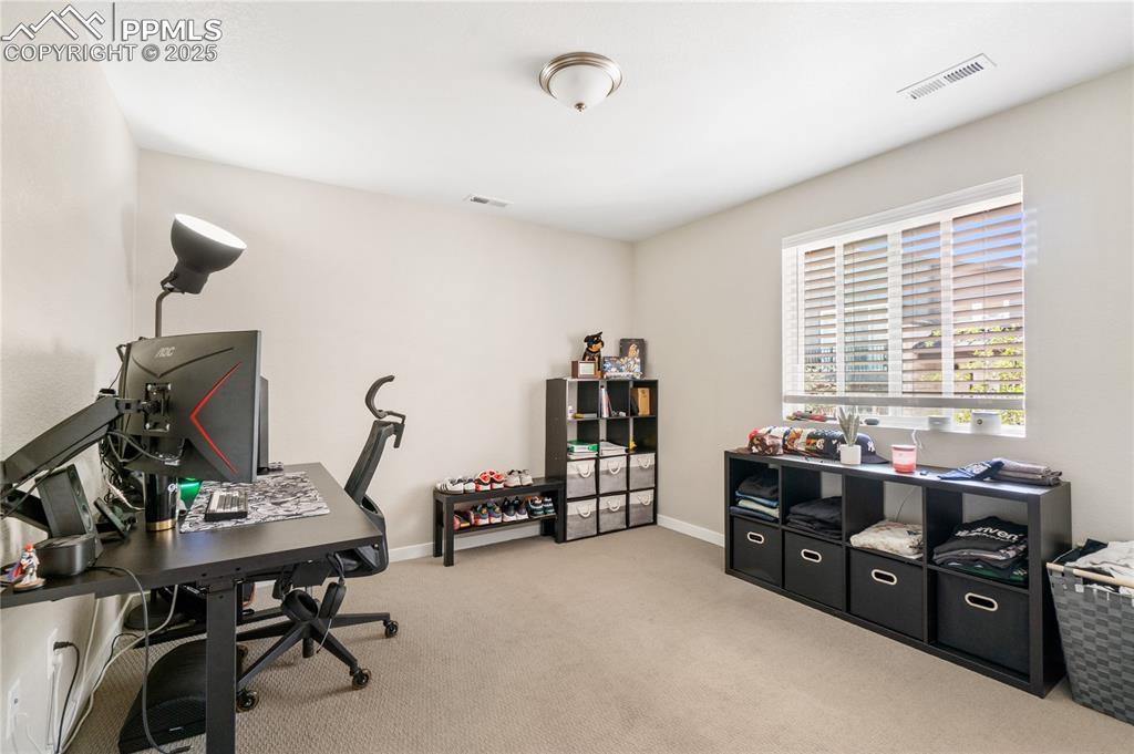 Image 36 of 42: Lower level bedroom