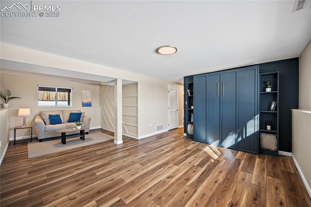 Image 27 of 45: Custom murphy bed, for addtional sleeping when needed. 